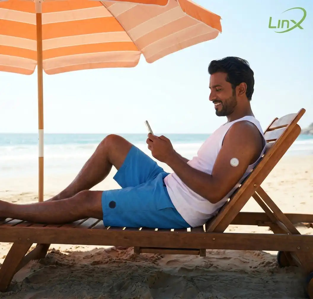 An Omani man sat down and placed a Linx sensor on his arm.